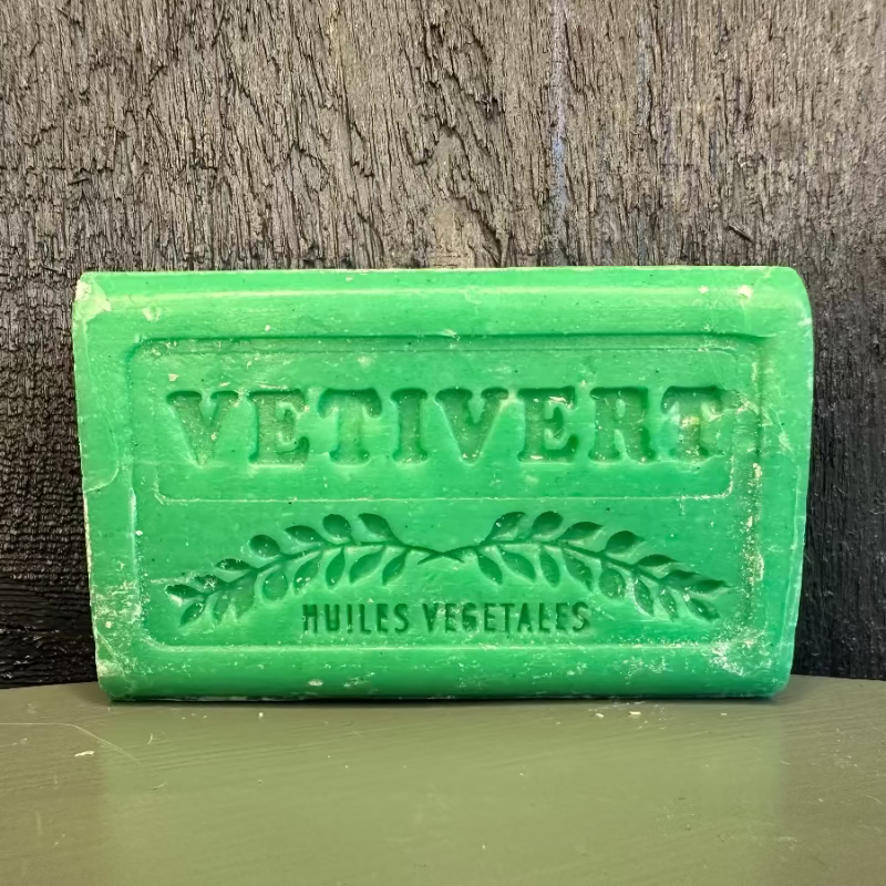 Green bar of soap with &