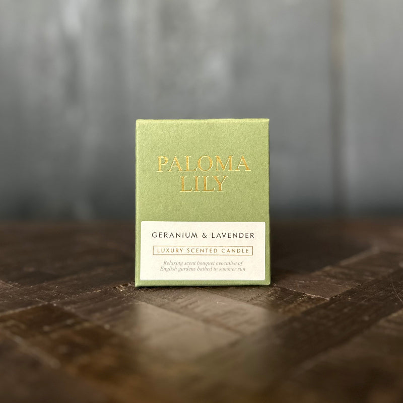 Green candle box labeled &