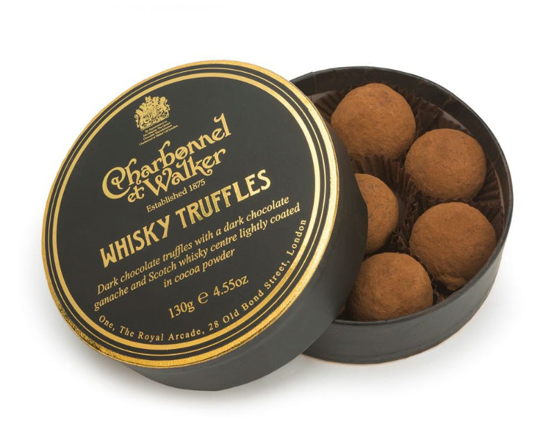 Box of Charbonnel et Walker whisky truffles on a white background